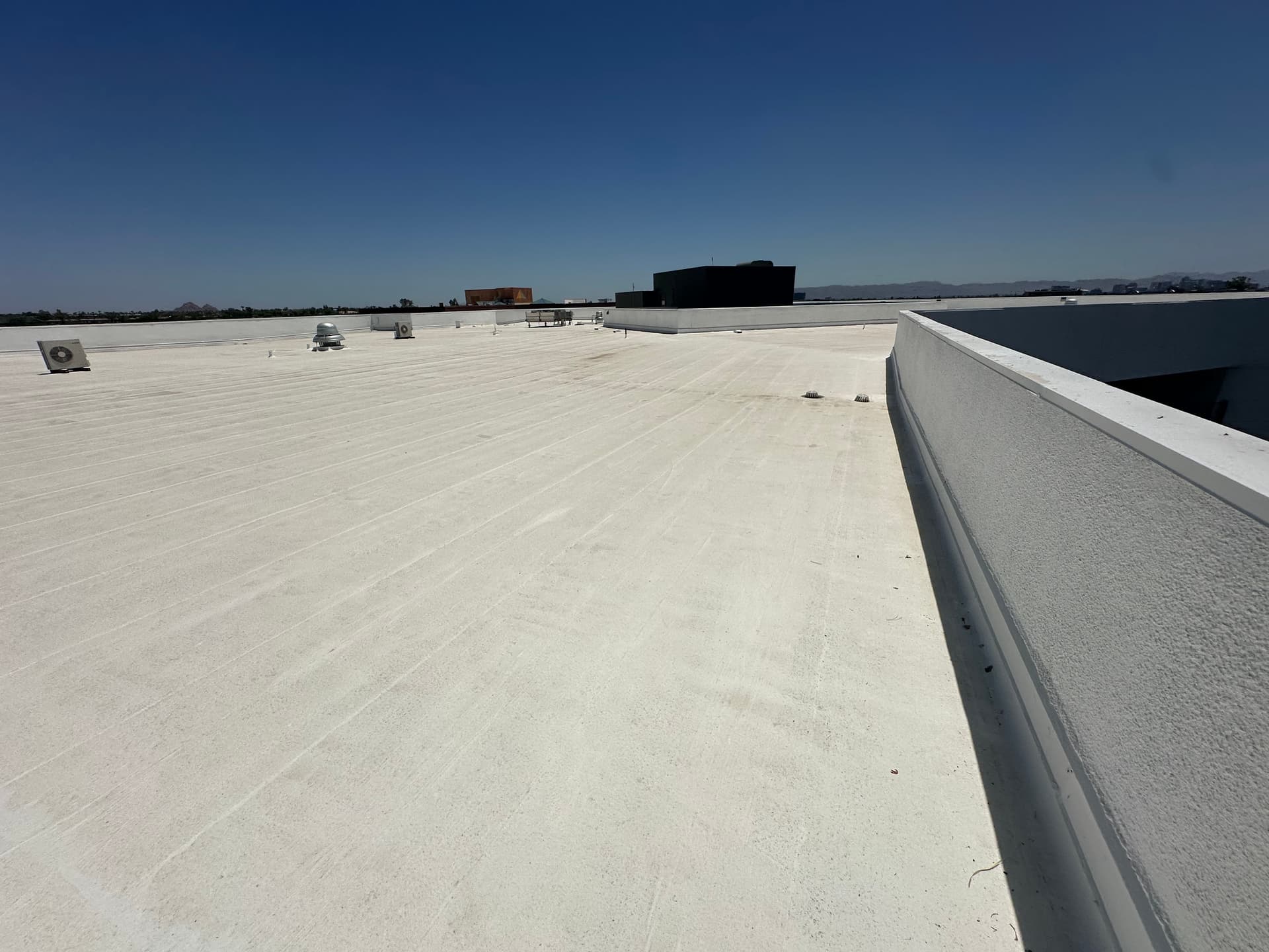 Flat Roof Repairs Underway for Commercial Building