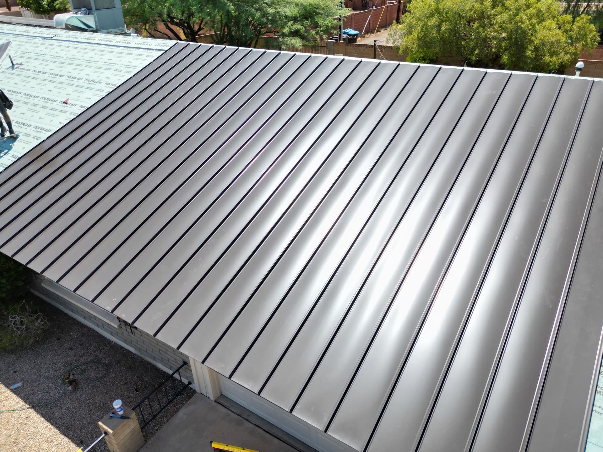 Why Your Metal Roof Panels Look Wavy and How We Fix It image